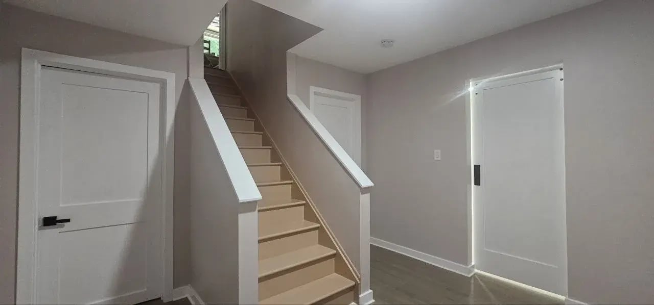 Finished stair hall with new doors