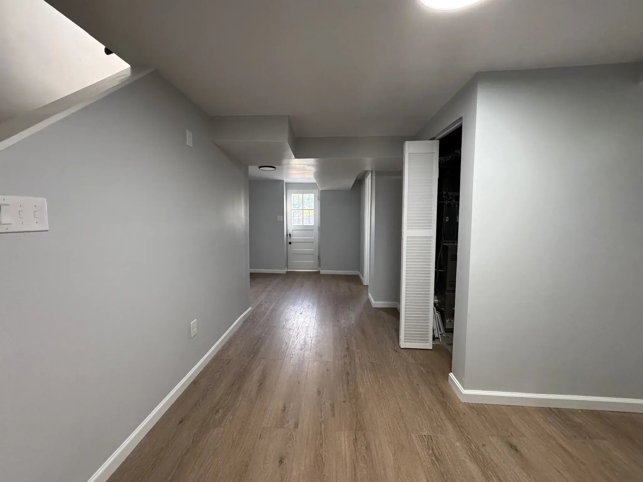 Hallway with new flooring and fresh paint