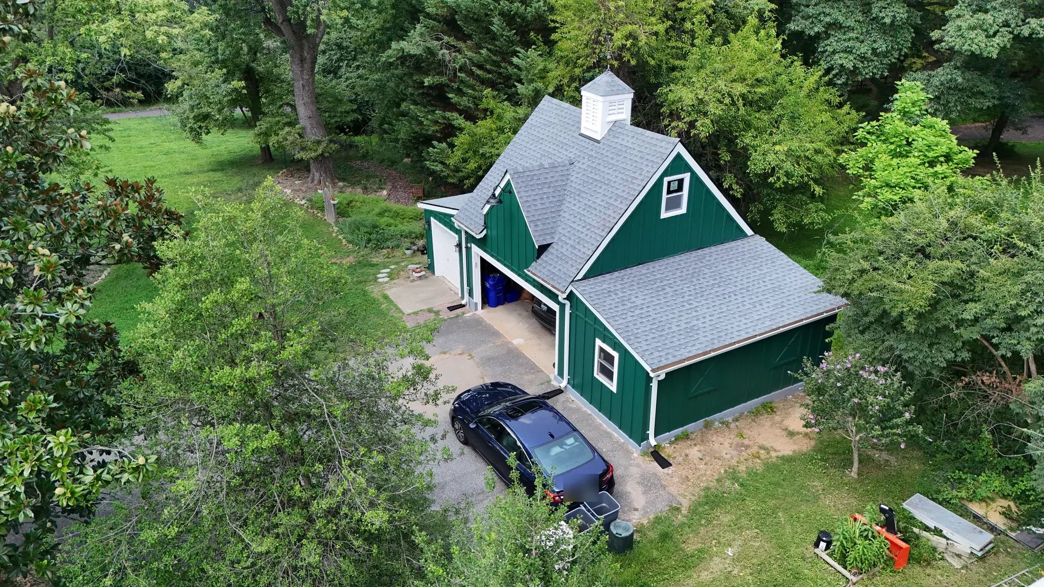 Drone view of the renovated garage and driveway