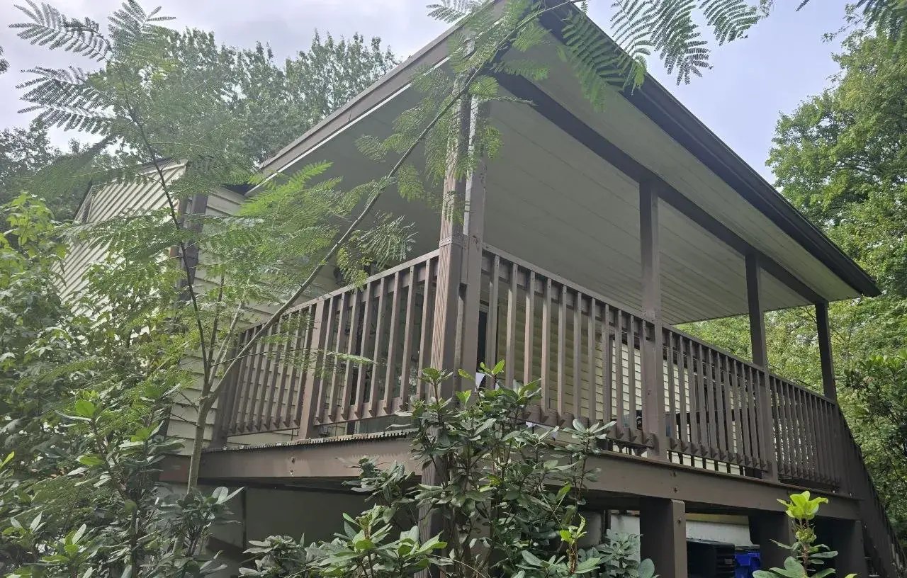 Painted covered deck and railings, side view