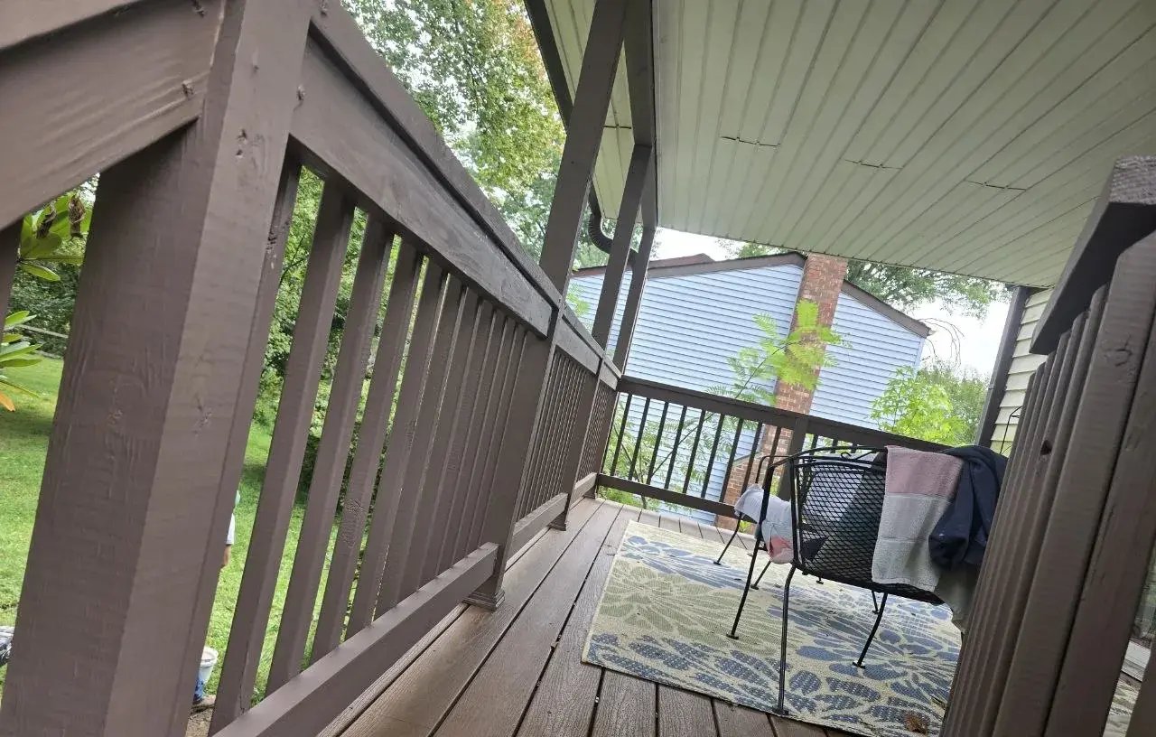 Composite decking and painted railings on the finished deck
