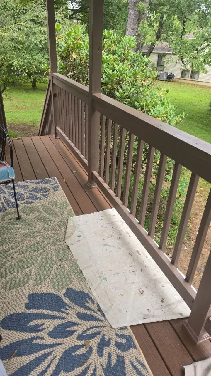 Finished deck corner with painted railings