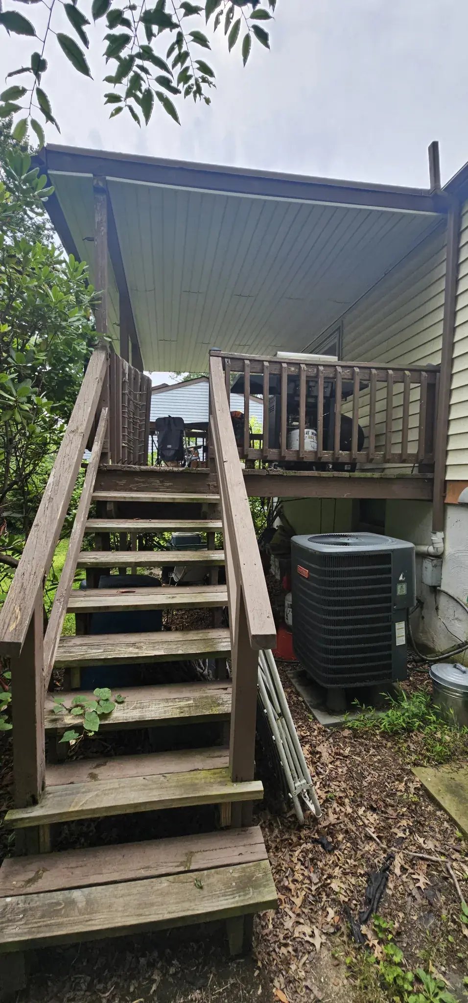 Old wooden deck stairs before replacement