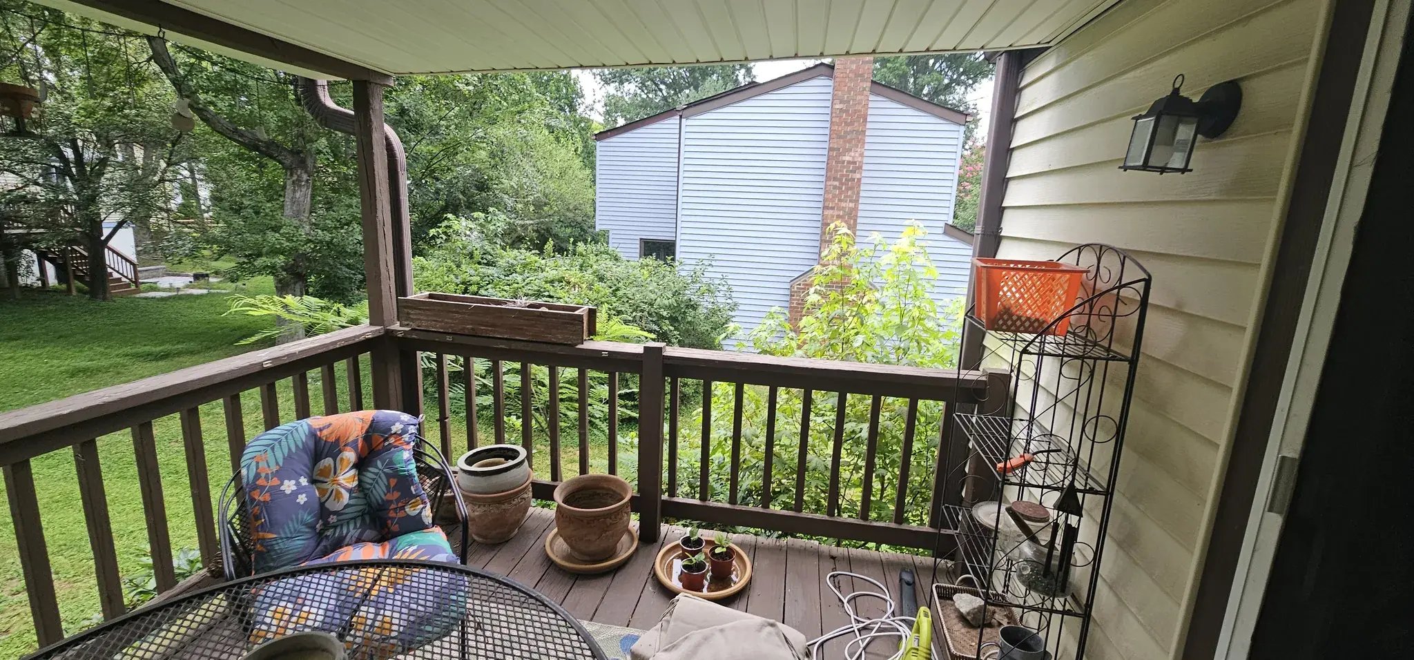 Old deck surface with worn boards and railings