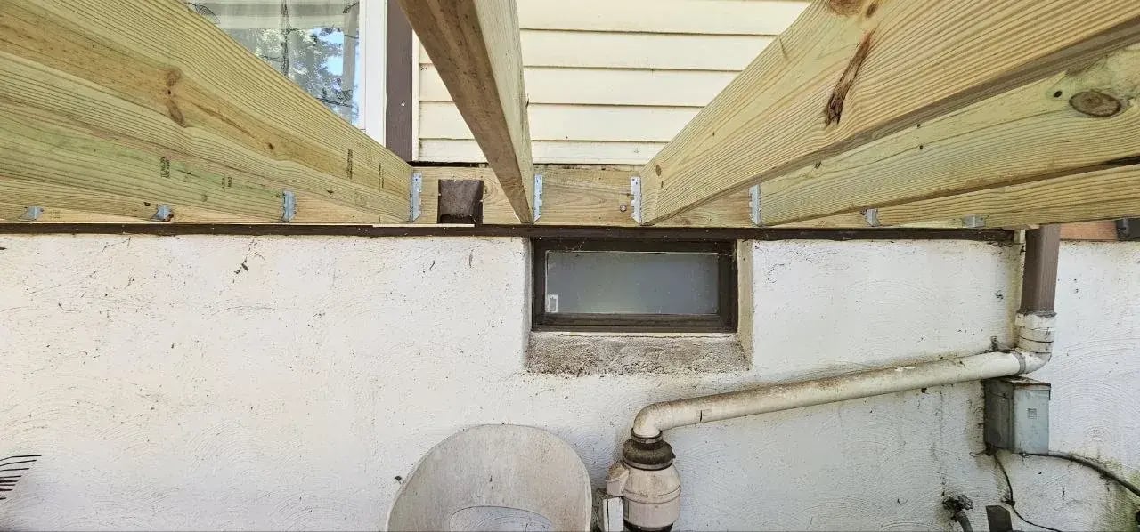 Joist hangers and ledger connection on the new deck frame