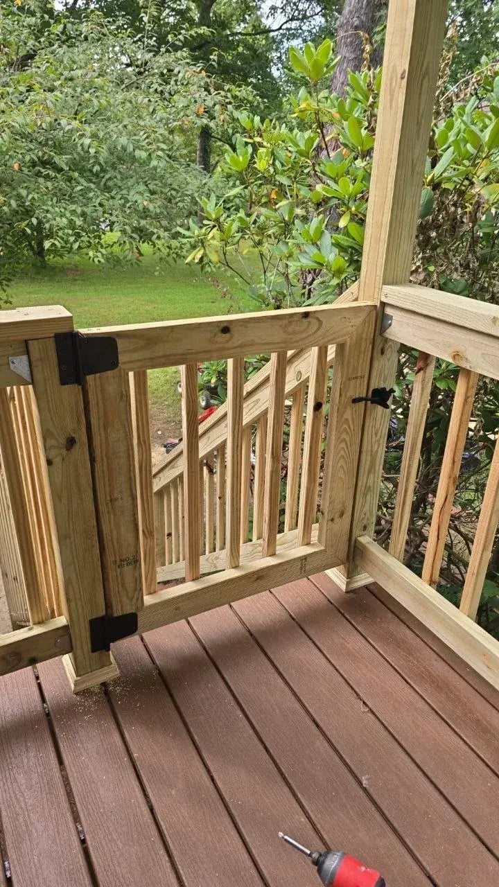 New deck gate with pressure-treated railings and composite decking