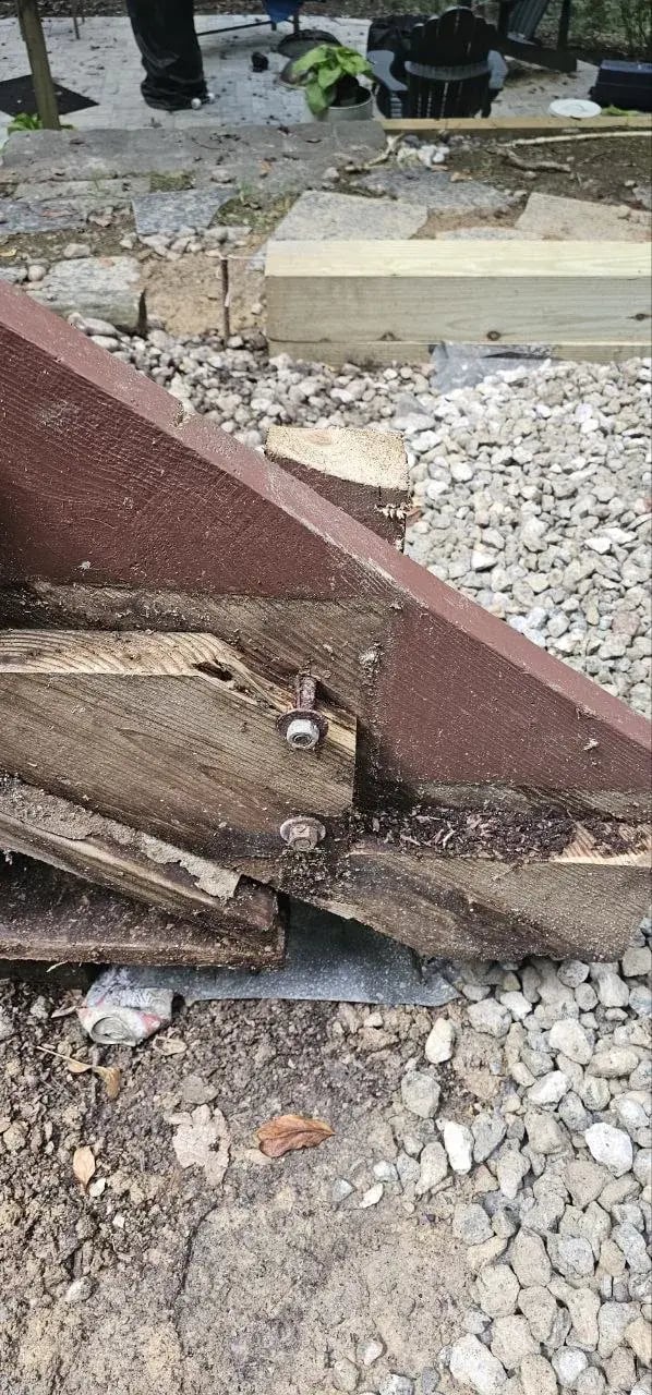Rotted bottom of the old stair stringer