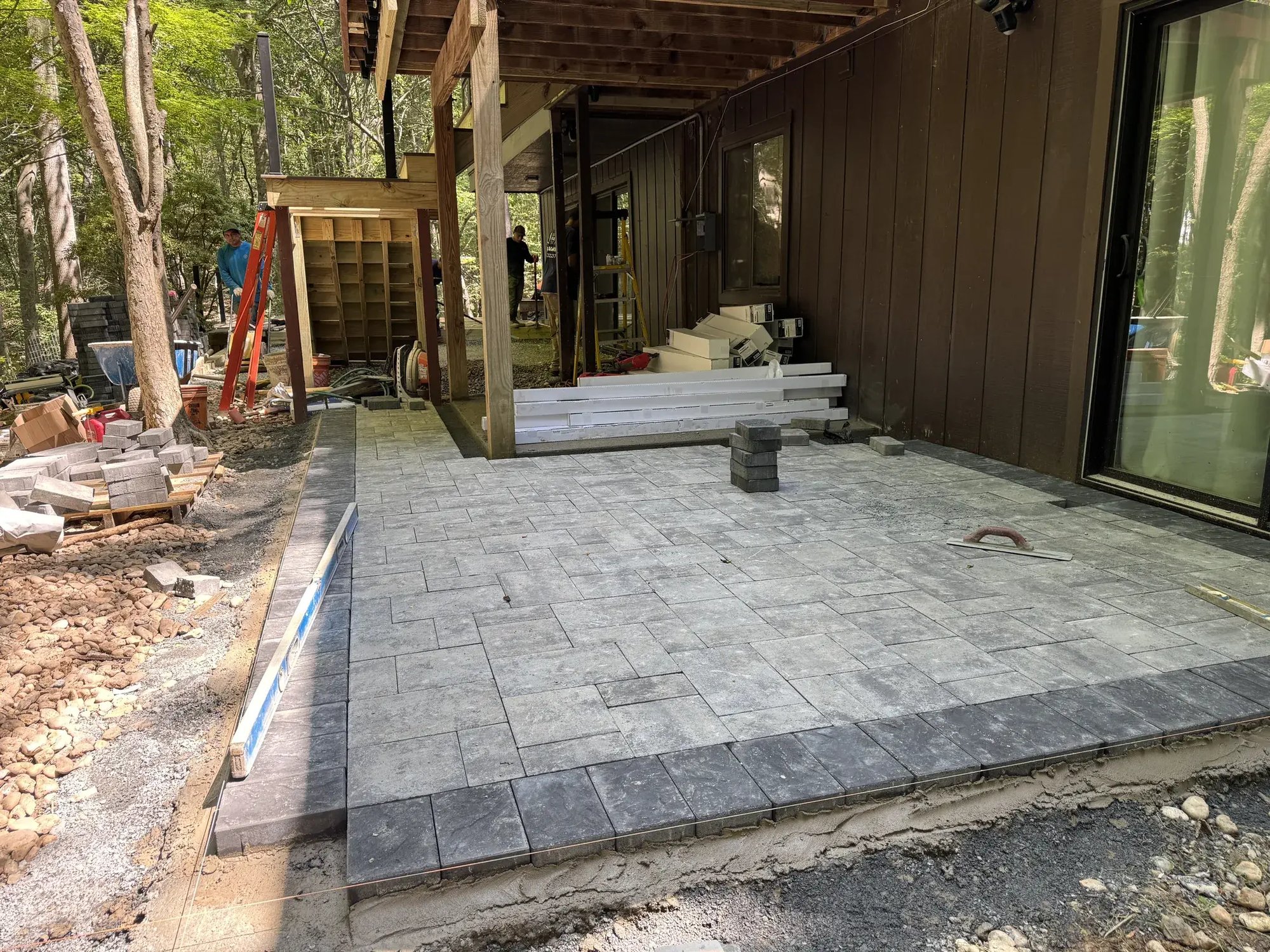 New paver patio going in at the lower level