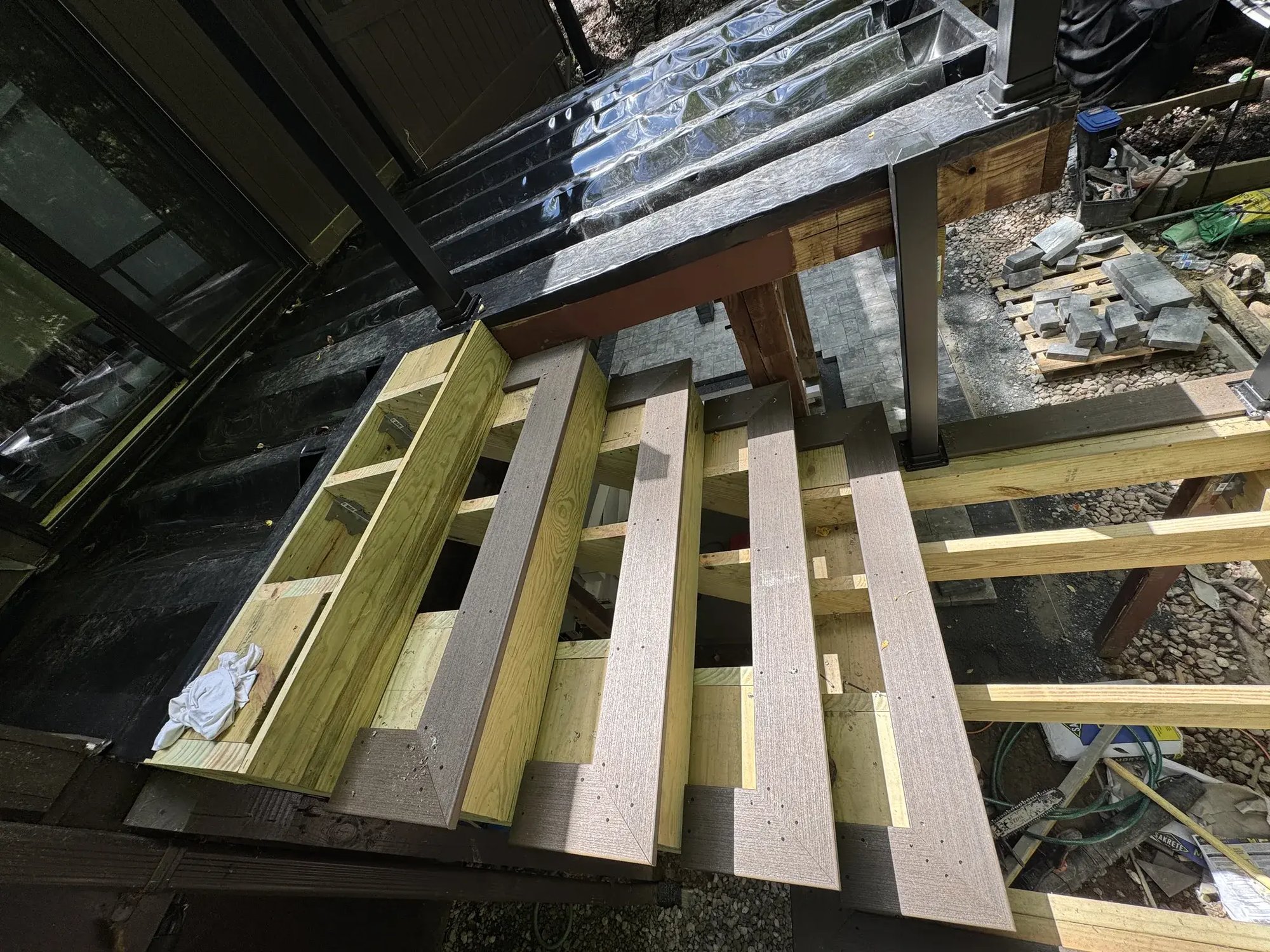 Composite deck boards going on the new frame