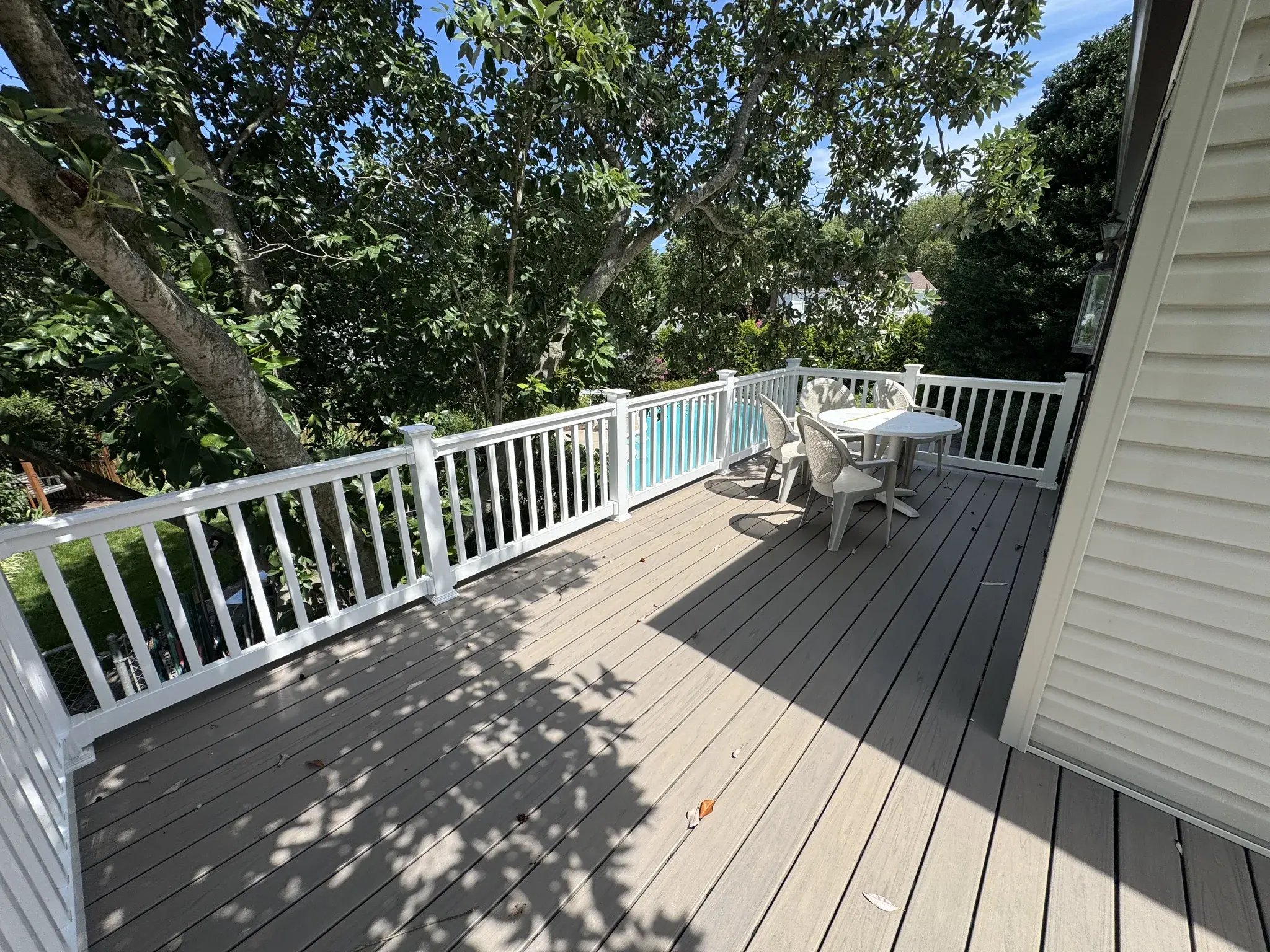 New composite deck with white vinyl railings