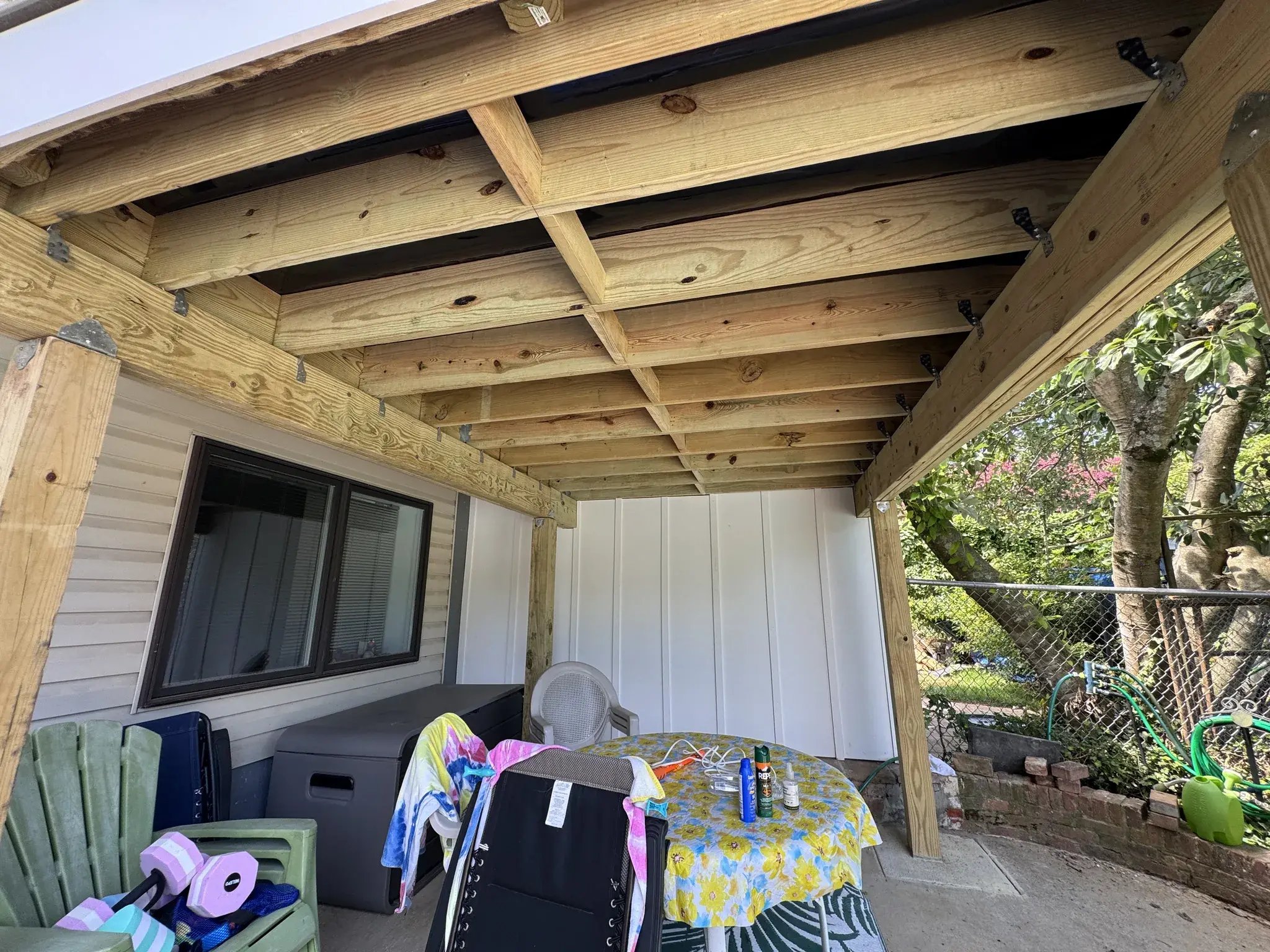 New framing and posts over the back patio