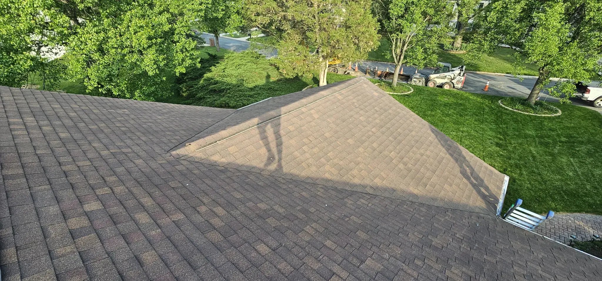 Worn asphalt shingles on the old roof