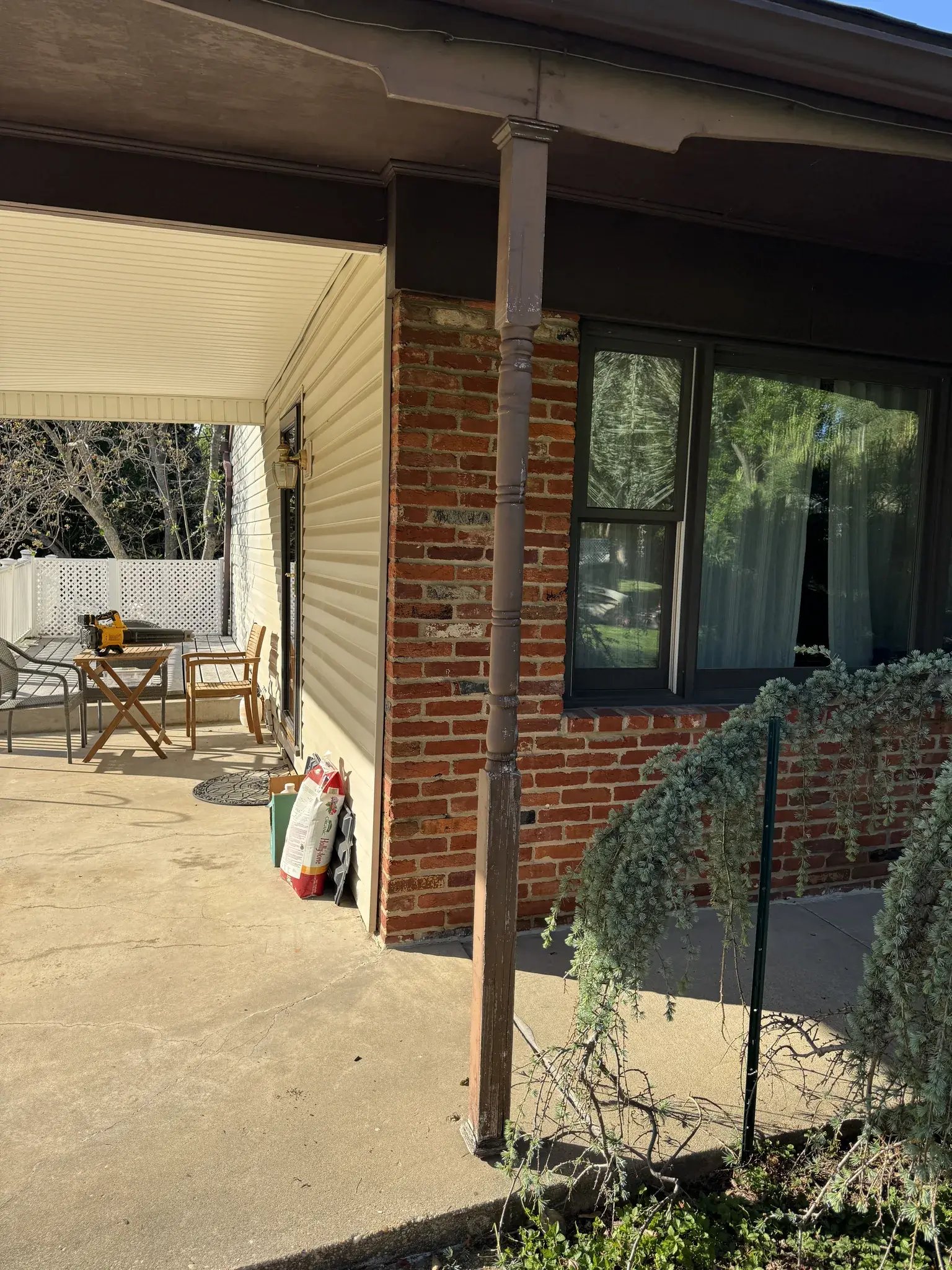 Old front porch posts before replacement
