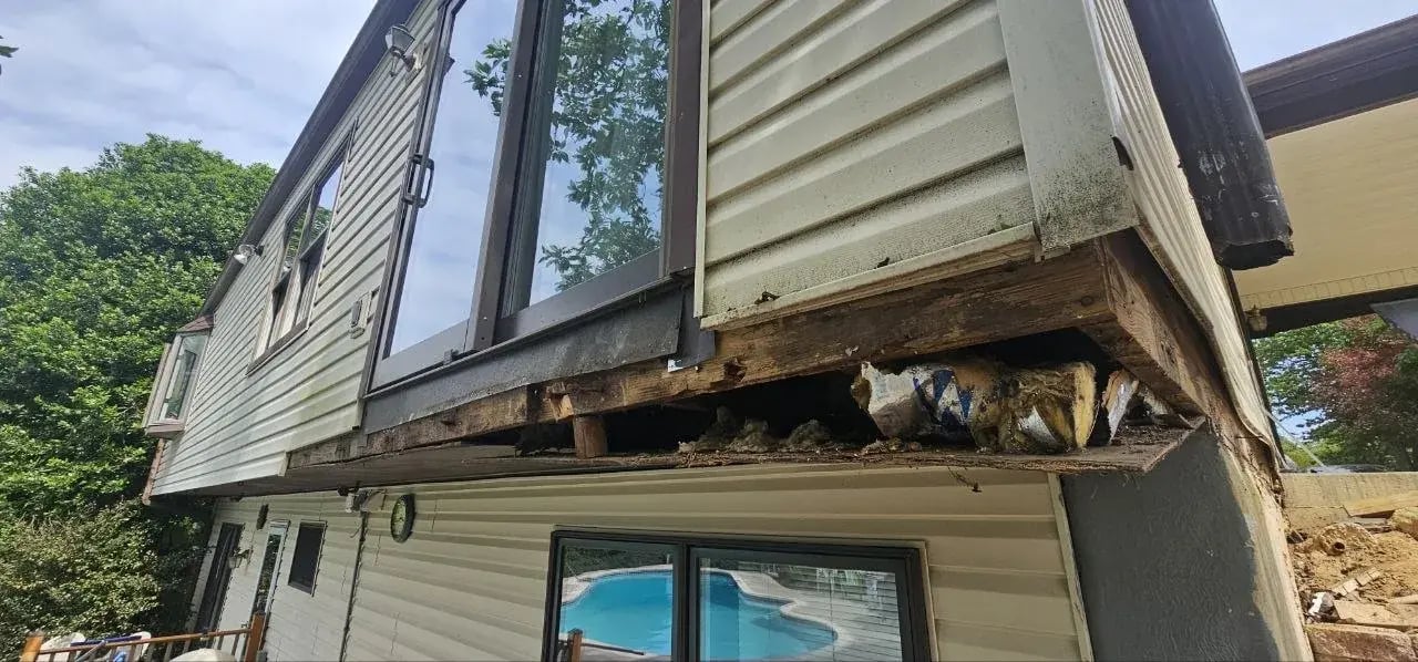 Rotted rim board found after the old deck came off