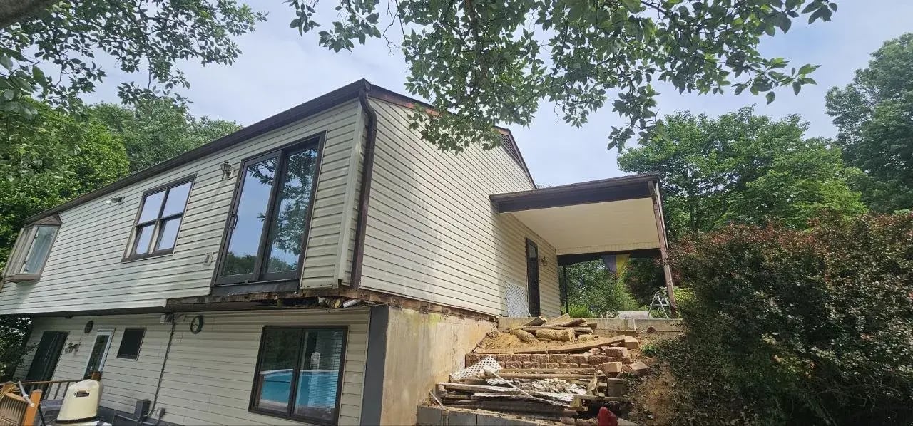 Old deck removed, house wall exposed