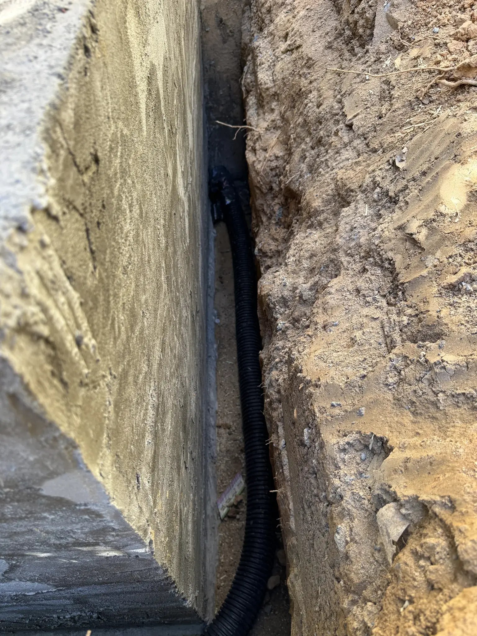 Waterproofing and drain pipe behind the retaining wall