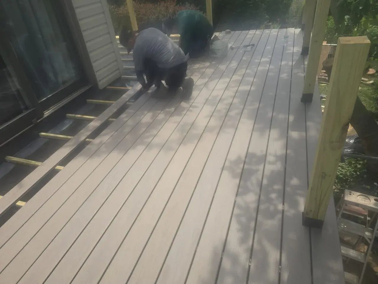 Composite decking going on the new frame